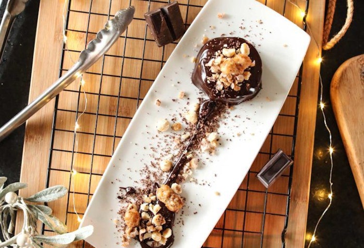 Chocolate Hazelnut Bomb with Caramel Sauce and Sugared Nuts (GF)